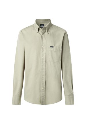 Chemise à manches longues vert clair avec des boutons en coton, dotée d'une poche avant et d'un petit patch logo sur la poitrine gauche.
