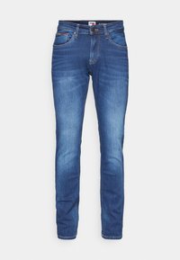 Blå denimjeans tillverkade av bomull med rak passform, med knappstängning, fem fickor och subtila blekningar på tyget.