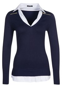 Navy knit sweater with a V-neck and long sleeves, layered over a white collared shirt. Features a gold zipper accent on the shoulder.