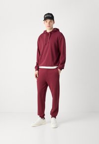 HUGO TRACKSUIT DAPODAYOTE SET - Treniņtērps - dark pink