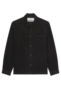 Černá manšestrová košile s límečkem na knoflíky, přední kapsou a dlouhými rukávy s knoflíkovými manžetami a vertikální žebrovanou texturou.