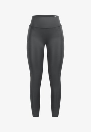 Graue Sportleggings mit hoher Taille, sanfter Textur, seitlichen Taschen und figurbetontem Design für uneingeschränkte Bewegungsfreiheit.