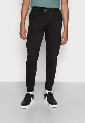 Zwarte cargo joggers met een trekkoord in de taille, twee zijzakken, geribbelde boorden en een gladde katoenmix stof.