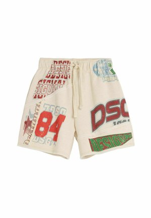 Kremfarvede shorts med elastisk talje og snøre, med store røde, grønne og blå grafiske tekst og tal foran og på siderne.