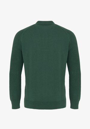 Tumesroheline pikkade käistega kootud kampsun, millel on soonikservad ääres, varrukate otstes ja väike püstihoidev krae, nähtud tagantpoolt.