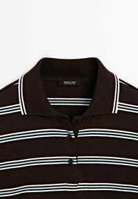 Brown short-sleeve polo shirt featuring white and light blue horizontal stripes, two buttons at the collar, and a ribbed neckline.