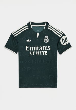 Maillot de football Real Madrid vert foncé avec des bandes blanches sur les épaules, logos "Emirates Fly Better" et "hp", ainsi que les emblèmes du club et d'Adidas.
