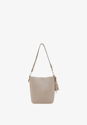 Beige leather bucket bag with a long adjustable strap and attached small pouch hanging on the side against white background.