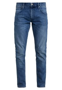 Tmavě modré džíny z denimu s úzkým střihem, designem na pět kapes a jemně vybledlým povrchem. Zapínání na značkový knoflík a zip.