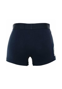 Boxers en coton navy avec une ceinture noire et un détail graphique blanc sur le côté droit. Tissu extensible avec une texture lisse.