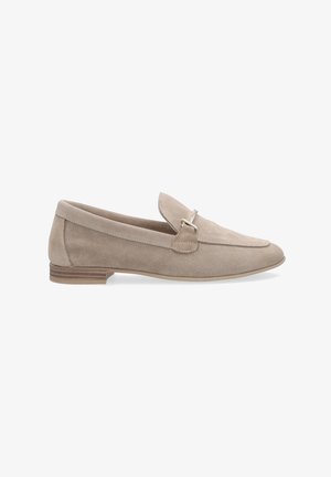 Beige suede loafers with a flat heel, a folded tongue, a small silver-tone hardware accent, and stitching details along the edges.