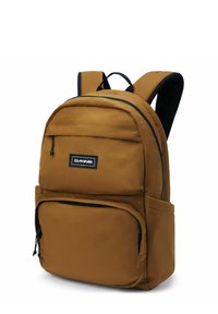 Ruskea kangaskassi, jossa on kaksiosaiset vetoketjut, pehmustetut olkahihnat ja mustat yksityiskohdat. Tässä on myös ulkoinen etutasku.