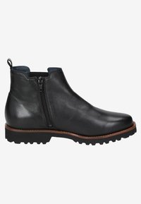 Bottine en cuir noir avec fermeture éclair sur le côté, bordure marron et semelle épaisse à relief, présentée de côté extérieur sur fond blanc.