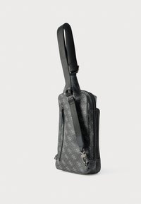 Õlakott, hall sünteetiline materjal, millel on tõmblukuga sulgur, logomuster, reguleeritav rihm ja lame disain mugavaks kandmiseks.