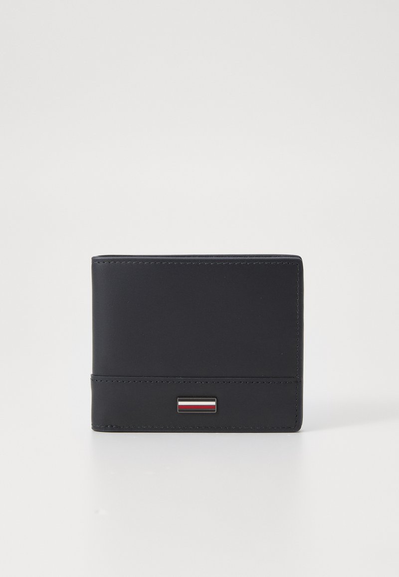 Black leather wallet with a slim design. Features a metallic accent with red, white, and blue stripes. Smooth texture and clean edges.