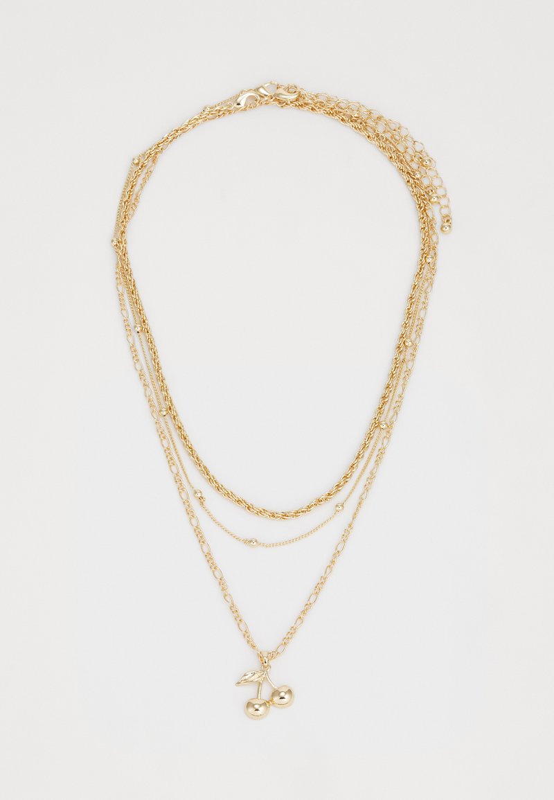 Collier en or avec plusieurs styles de chaînes, ornée d'un pendentif cerise au niveau le plus bas. Finitions texturées et polies.
