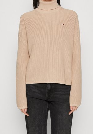 Stickad tröja - beige