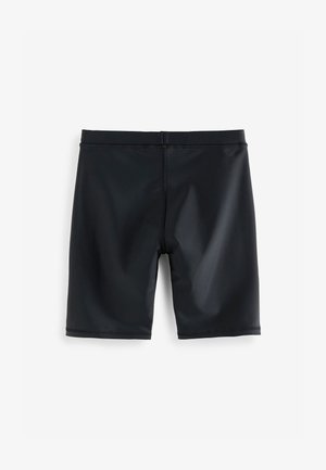 Melnas peldbikses ar pieguļošu dizainu, izgatavotas no gluda, elastīga materiāla. Tās ir ar vienkāršu jostasvietu un plakanām šuvēm.