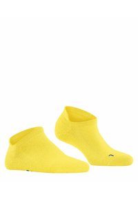 Calzini gialli alla caviglia realizzati in materiale morbido e texturizzato, con un bordo a costine e un piccolo accento blu sul lato.