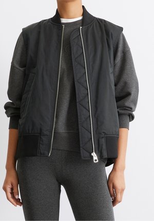 Smanicato - black