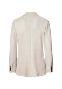 Ljust beige kavaj med en texturerad tyg, spetsiga slag, en enda bakre slits och tre-knapps manschettdetalj. Skräddarsydd och figursydd design.