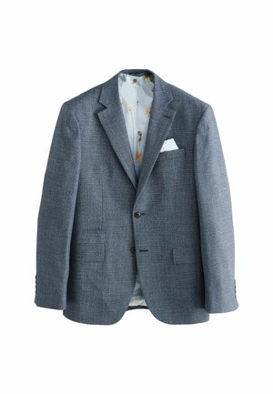 Grå tekstureret blazer med to forlommer og en enkelt brystlomme; har en lys mønstret indvendig foret.