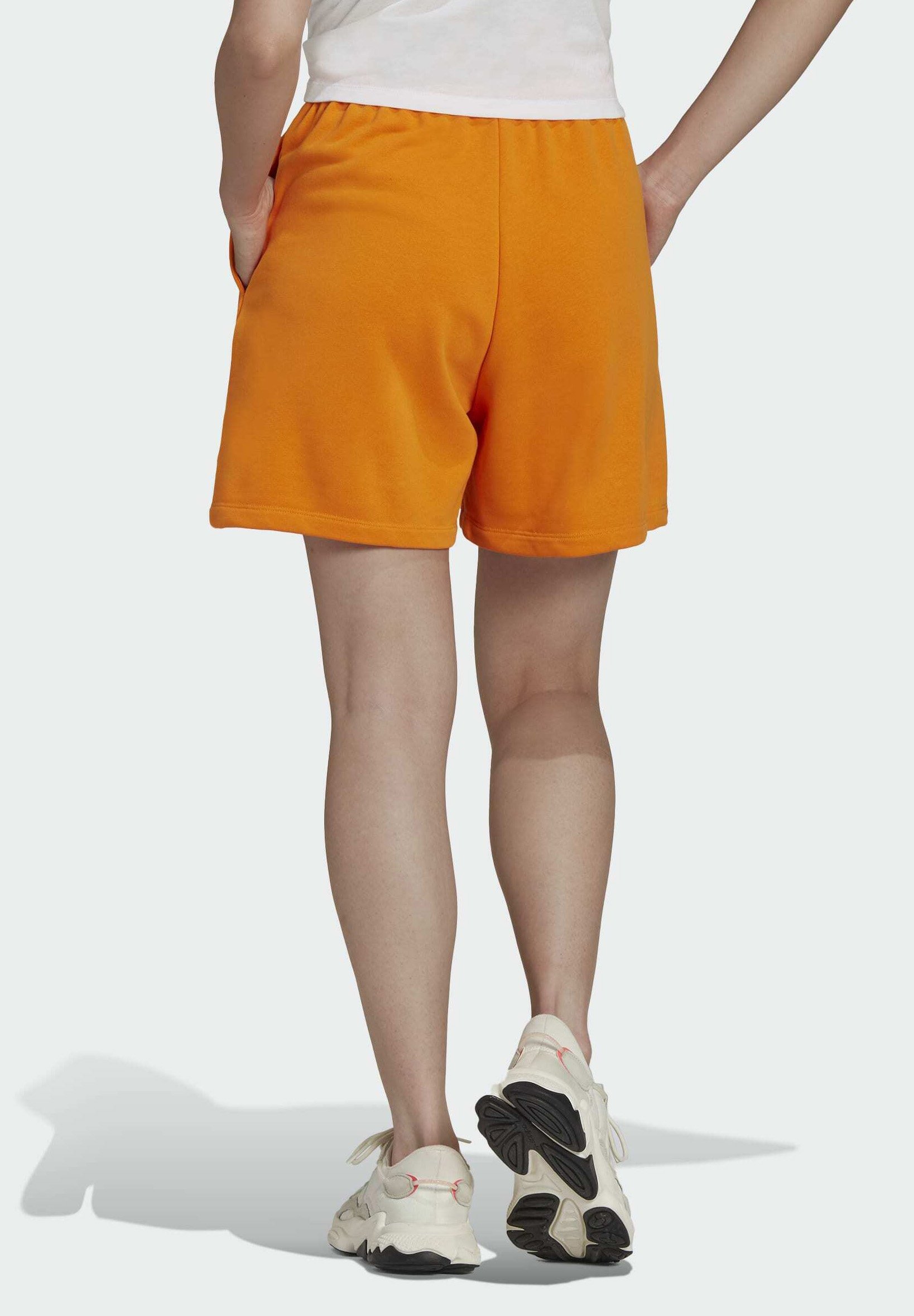 adidas orange shorts and top