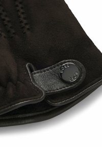Guanti in camoscio nero con rifiniture in pelle, dotati di un bottone nero lucido e dettagli trapuntati lungo il polso, texture morbida e finitura liscia.