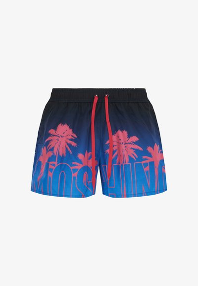 Navy and blue swim shorts with red palm tree print, red drawstring, and large stylized text on the front.