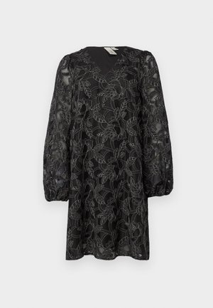 Black lace dress with a V-neckline and long puff sleeves. It features floral patterns and a textured overlay. Mid-thigh length.