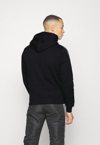Sergio Tacchini DELACO HOODIE - Sweatshirt - black/white