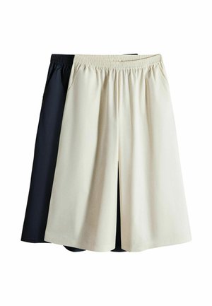 Zwei Paar Hosen mit weitem Bein und elastischem Bund, eines vorne beige und eines hinten schwarz, flach auf weißem Hintergrund dargestellt.