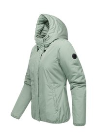 Light green hooded jacket with a zip front, side pockets, and adjustable drawstring. Features a round logo patch on the left sleeve.