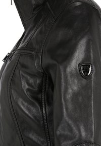 H.I.S MIT STEHKRAGEN - Lederjacke - black