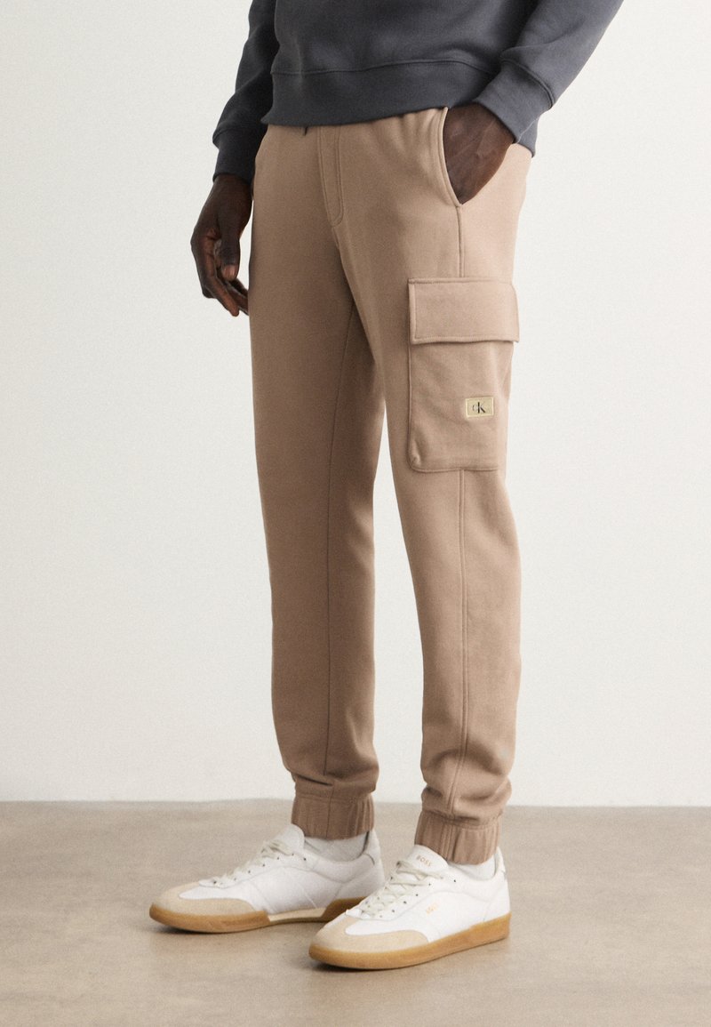 Calvin Klein Jeans - Tracksuit bottoms - taupe gray, Enlarge