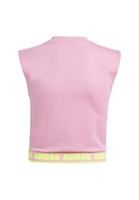 Ροζ χωρίς μανίκια τοπ με απαλό υφασμά. Διαθέτει κίτρινη ραφή με ρίγες που αναγράφει "ADIDAS" με έντονα γράμματα. Ελαφρύ και ελαστικό σχέδιο.