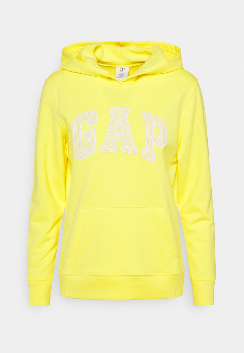Felpa gialla con tasca a marsupio, maniche lunghe e logo "GAP" bianco sul petto. Realizzata in tessuto morbido con una finitura liscia.