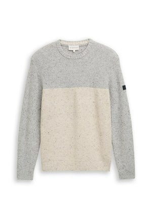 Garš sleeve adīts džemperis ar gaiši pelēku augšdaļu un piedurknēm, kā arī krēmkrāsas apakšējo daļu, ribota aproce un apakšmalā.