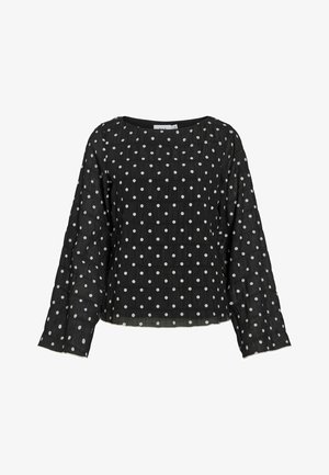 Czarna bluzka z długim rękawem wykonana z teksturowanej tkaniny w białe kropki. Posiada szeroki dekolt i prosty dół, luźny krój.