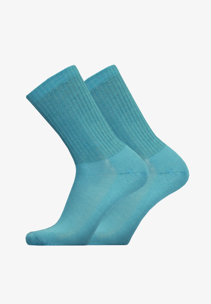 Light blue cotton socks with ribbed cuff, crew length, and seamless toe design. Smooth texture and flexible fit.