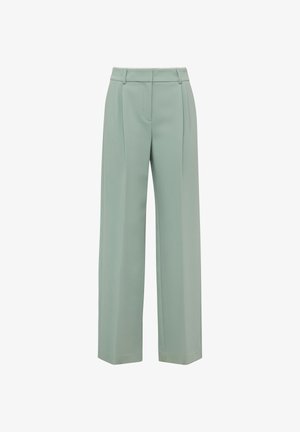 Pantaloni a gamba larga verde chiaro con pieghe sul davanti, passanti per cintura e chiusura frontale nascosta, mostrati su sfondo bianco.