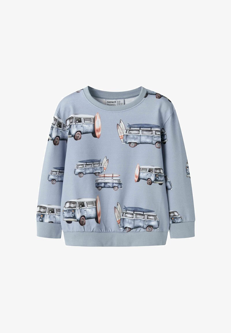 Sweat-shirt enfant bleu clair avec imprimé rétro de vans et planches de surf sur toute la surface, poignets et ourlet côtelés.