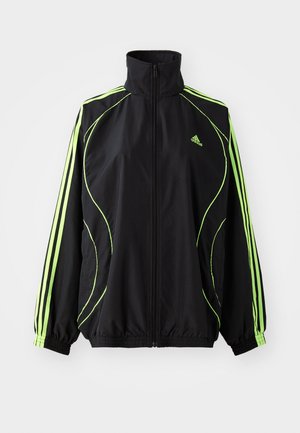 adidas Originals TEAMGEIST  - Könnyű dzseki - black/signal green