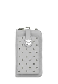 Grey leather wallet with perforated dots, a circular silver hardware detail, and a zip closure. Features a textured surface and slim design.