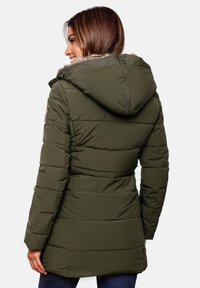 Olive green padded coat with a faux fur-lined hood, zip closure, vertical stitching, and side pockets.