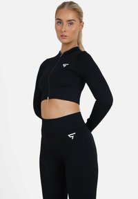 LONG SLEEVE NO SURRENDER SEAMLESS   - Vetoketjullinen college - black