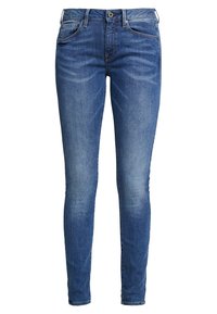 Skinny jeans van donkerblauwe denim, met een middelhoge taille, vijf zakken en een lichte vervaging op de bovenbenen voor textuur. Klassieke metalen knoopsluiting.