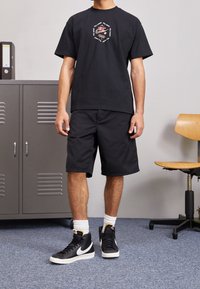 Nike Sportswear T-shirt med print - black