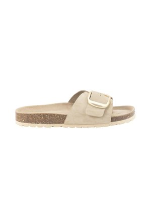 Sandalía deslizante de ante beige con una amplia correa y una gran hebilla decorativa. Plantilla de corcho y suela de goma texturizada para mayor agarre.