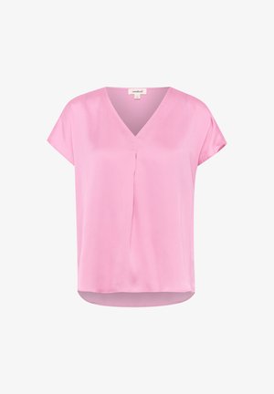 Roosa lühikeste varrukatega pluus, mis on valmistatud siledast ja kergest kangast, millel on V-kaelus ja diskreetne keskplekk, veidi kaardus alumine serv.